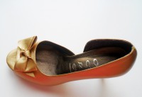 Zapato Moño Dorado